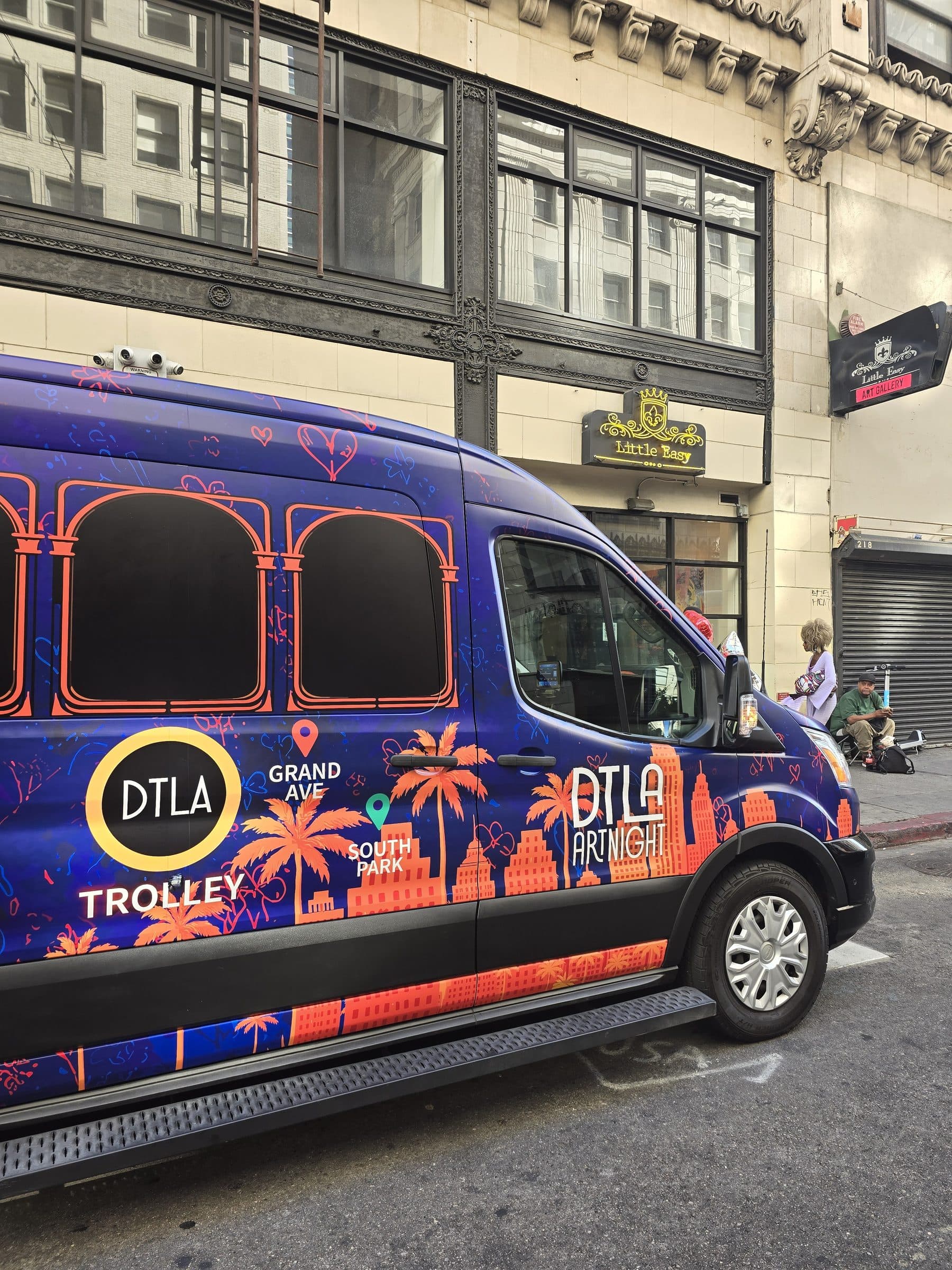 Dolly stopped outside Little Easy in the Historic Core